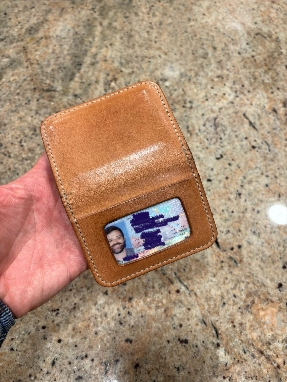 Photo by philbert on January 5, 2026 of the Self-Made ID Card Wallet in Unknown Natural Veg Tan Outside And Tanzanian Goat Inside.