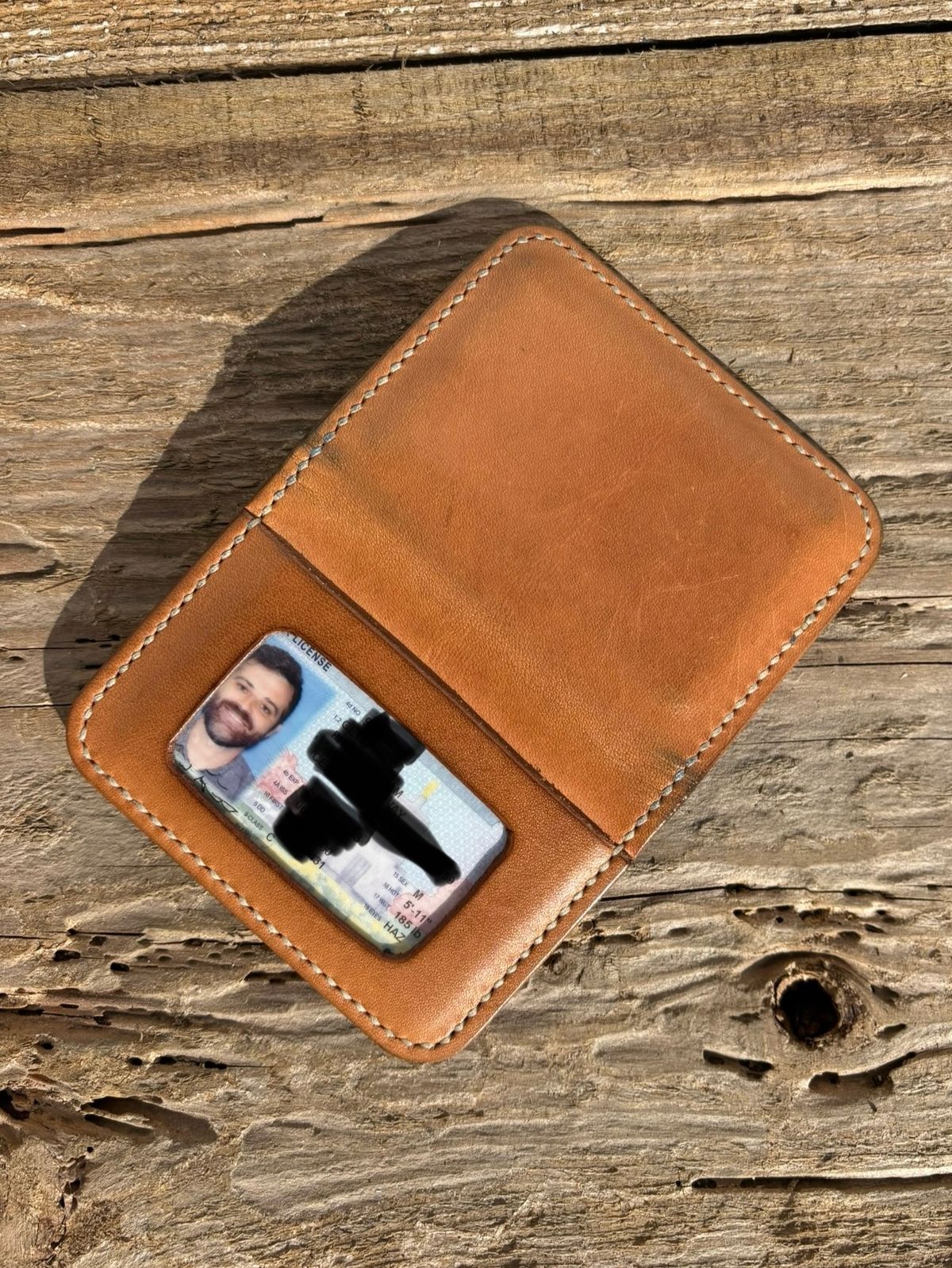 Photo by philbert on February 3, 2026 of the Self-Made ID Card Wallet in Unknown Natural Veg Tan Outside And Tanzanian Goat Inside.