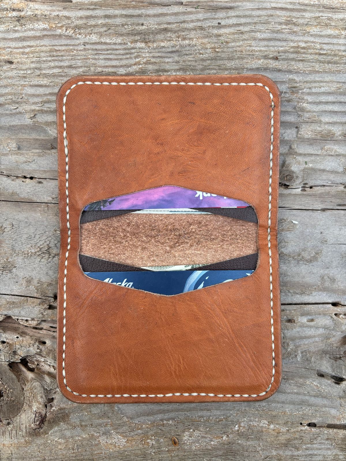 Photo by philbert on March 4, 2026 of the Self-Made ID Card Wallet in Unknown Natural Veg Tan Outside And Tanzanian Goat Inside.