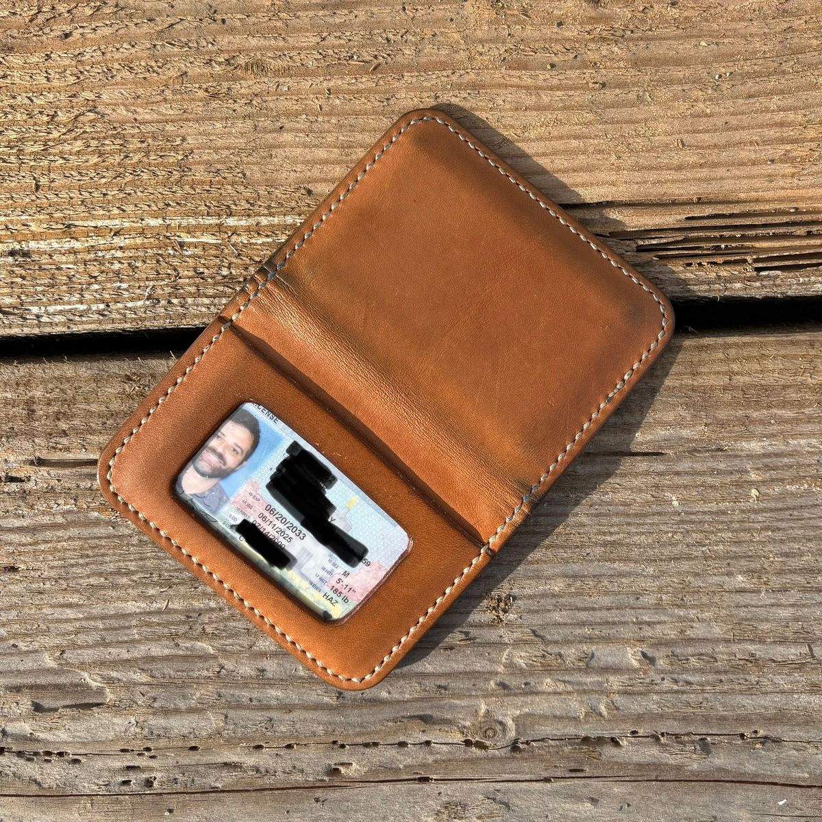 Photo by philbert on April 5, 2026 of the Self-Made ID Card Wallet in Unknown Natural Veg Tan Outside And Tanzanian Goat Inside.