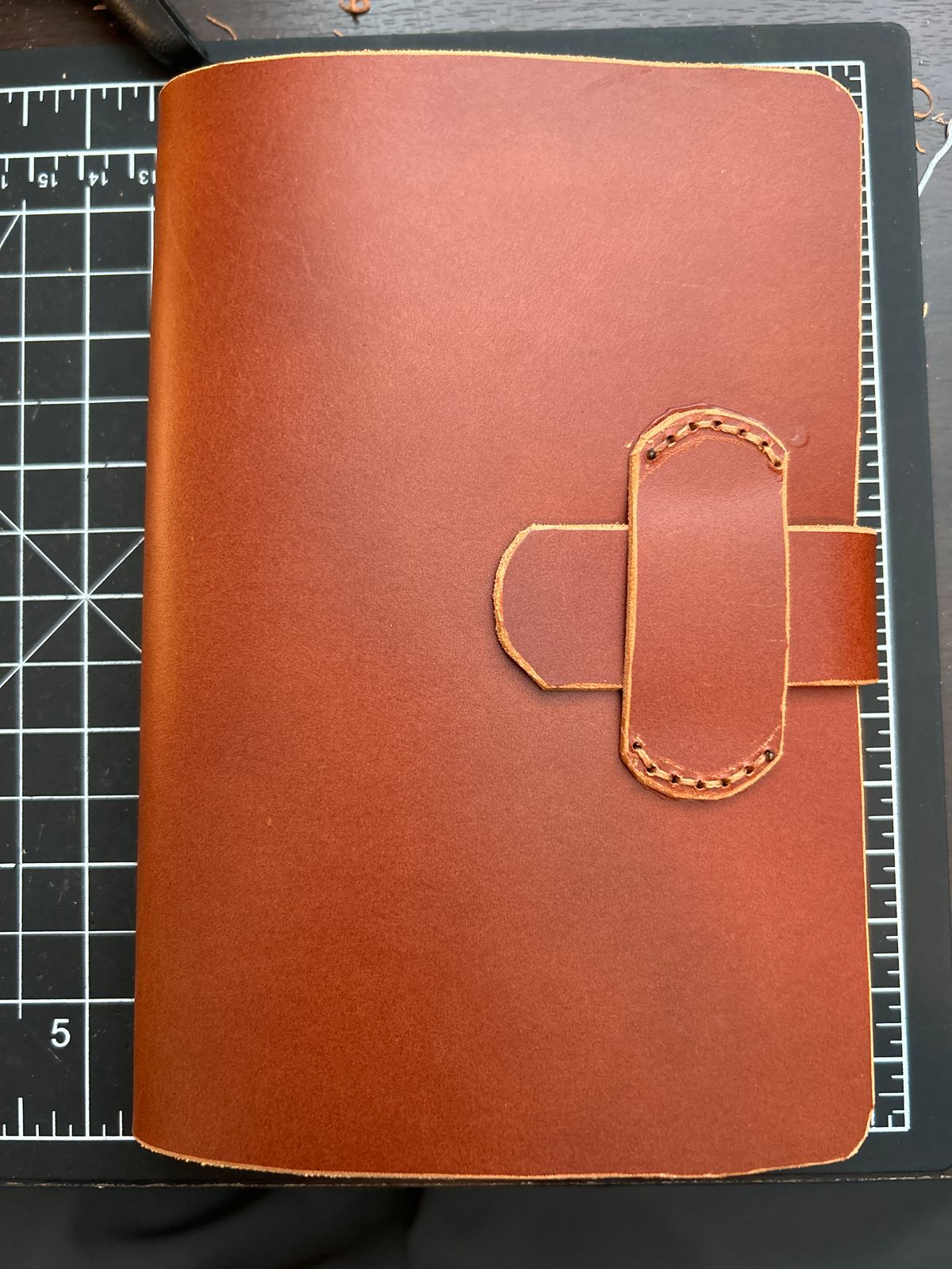 Photo by killerbootsman on October 13, 2024 of the Self-Made KBM Note Book Cover in Conceria Walpier Chestnut Buttero.