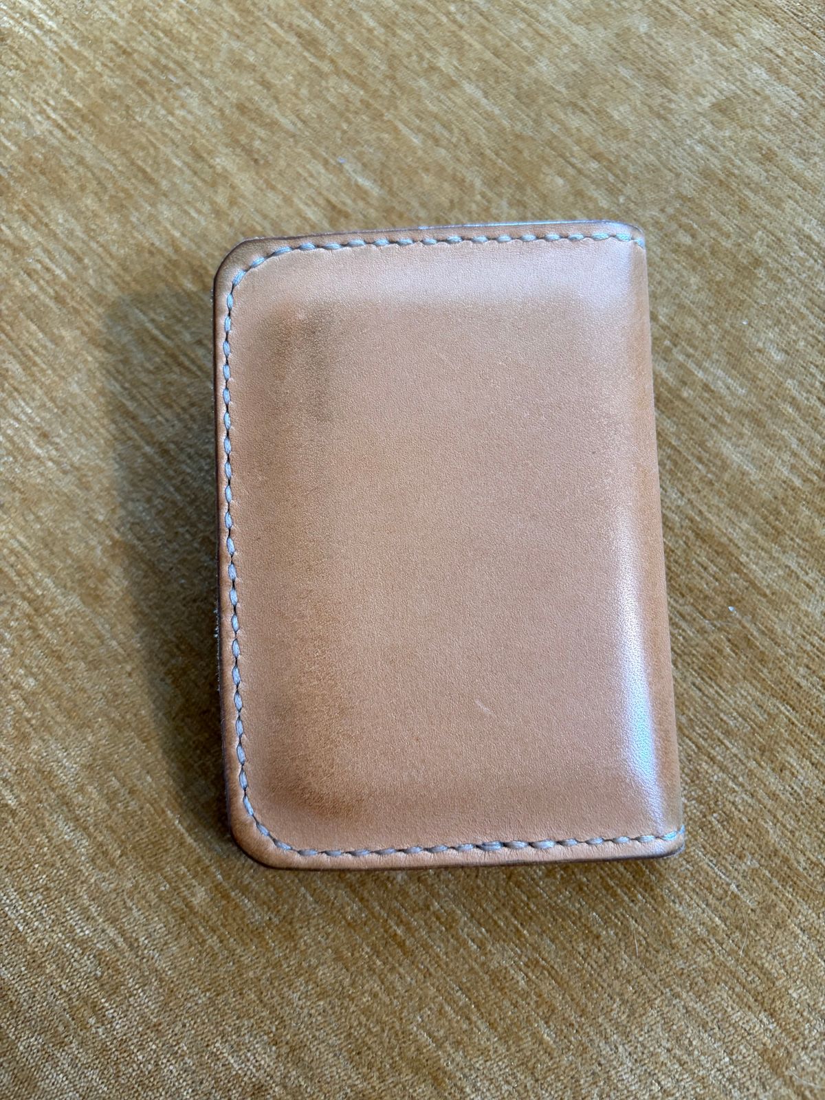 Photo by PinyonPine on January 3, 2026 of the Oldwalrus Two Slot Bifold Wallet in Horween Double Glazed Natural Latigo.
