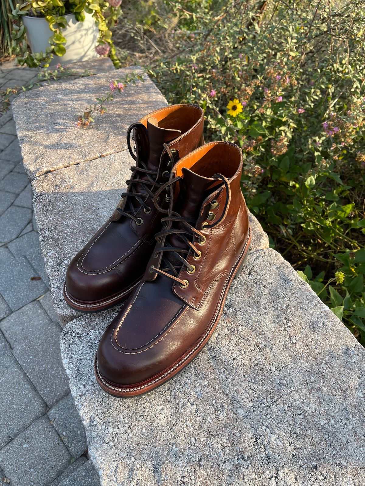 Photo by nosniv on May 12, 2024 of the Grant Stone Brass Boot in Horween Crimson Chromexcel.