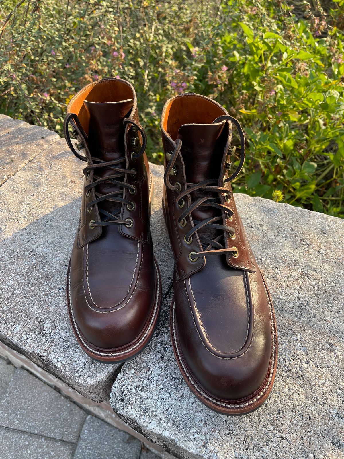 Photo by nosniv on May 12, 2024 of the Grant Stone Brass Boot in Horween Crimson Chromexcel.