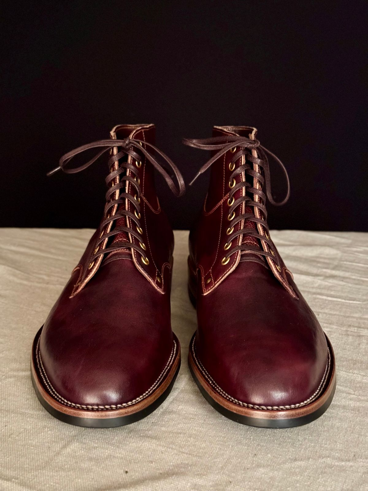 Photo by archwild on November 5, 2025 of the Østmo X Iron Boots Type 1 in Hand-Dyed Burgundy Maryam Washed Horsehide.