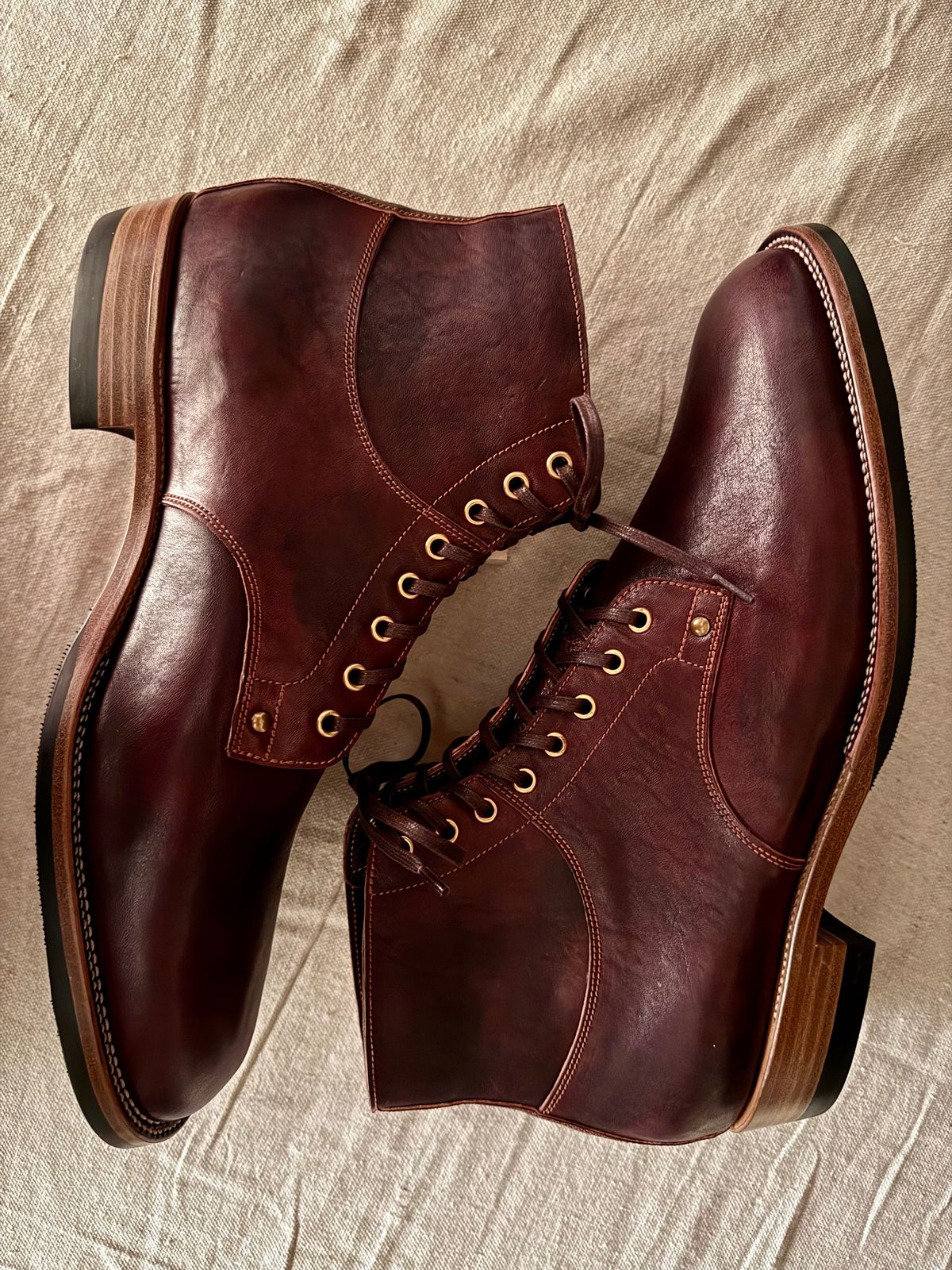 Photo by archwild on November 5, 2025 of the Østmo X Iron Boots Type 1 in Hand-Dyed Burgundy Maryam Washed Horsehide.