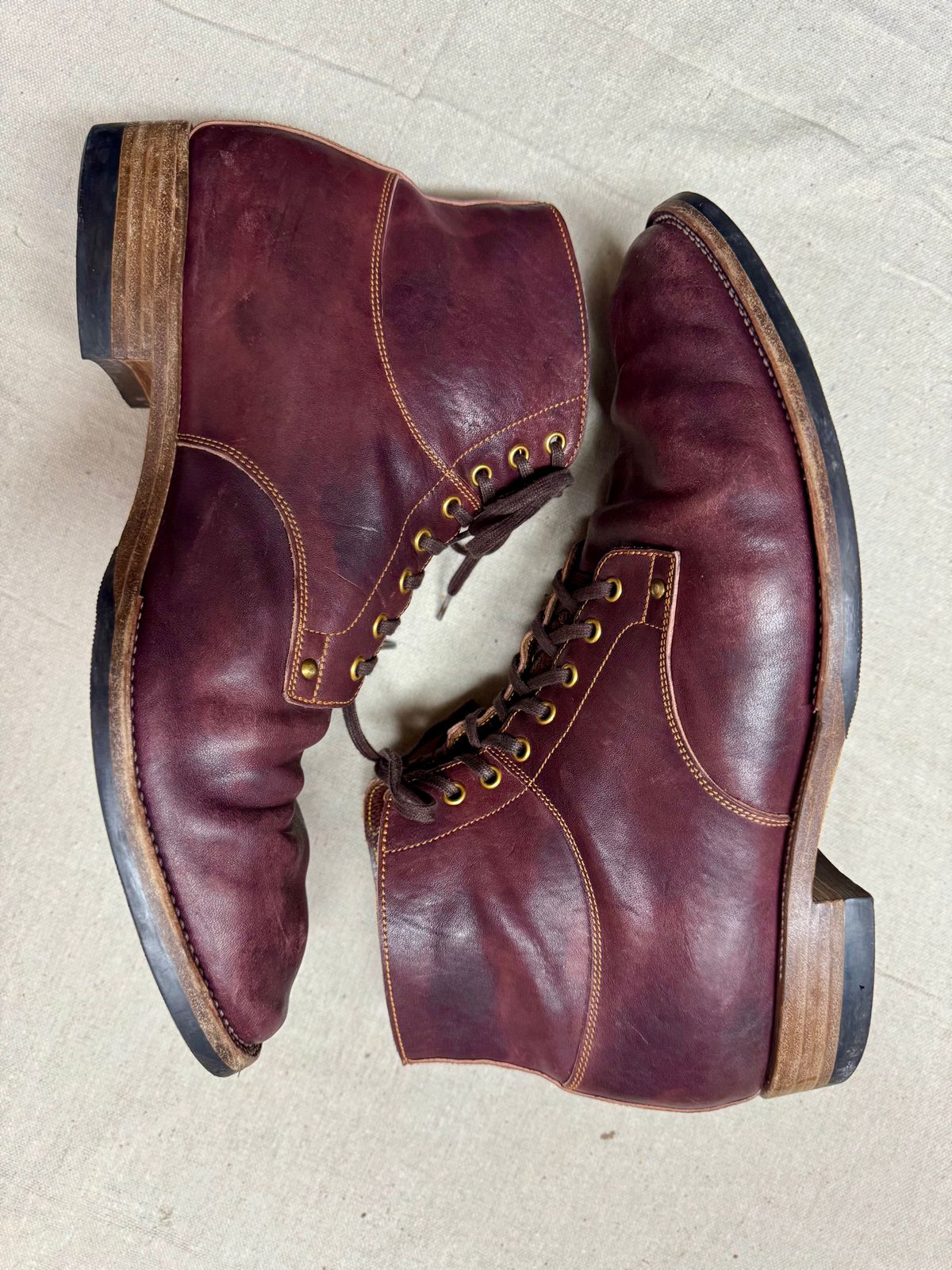 Photo by archwild on January 4, 2026 of the Østmo X Iron Boots Type 1 in Hand-Dyed Burgundy Maryam Washed Horsehide.