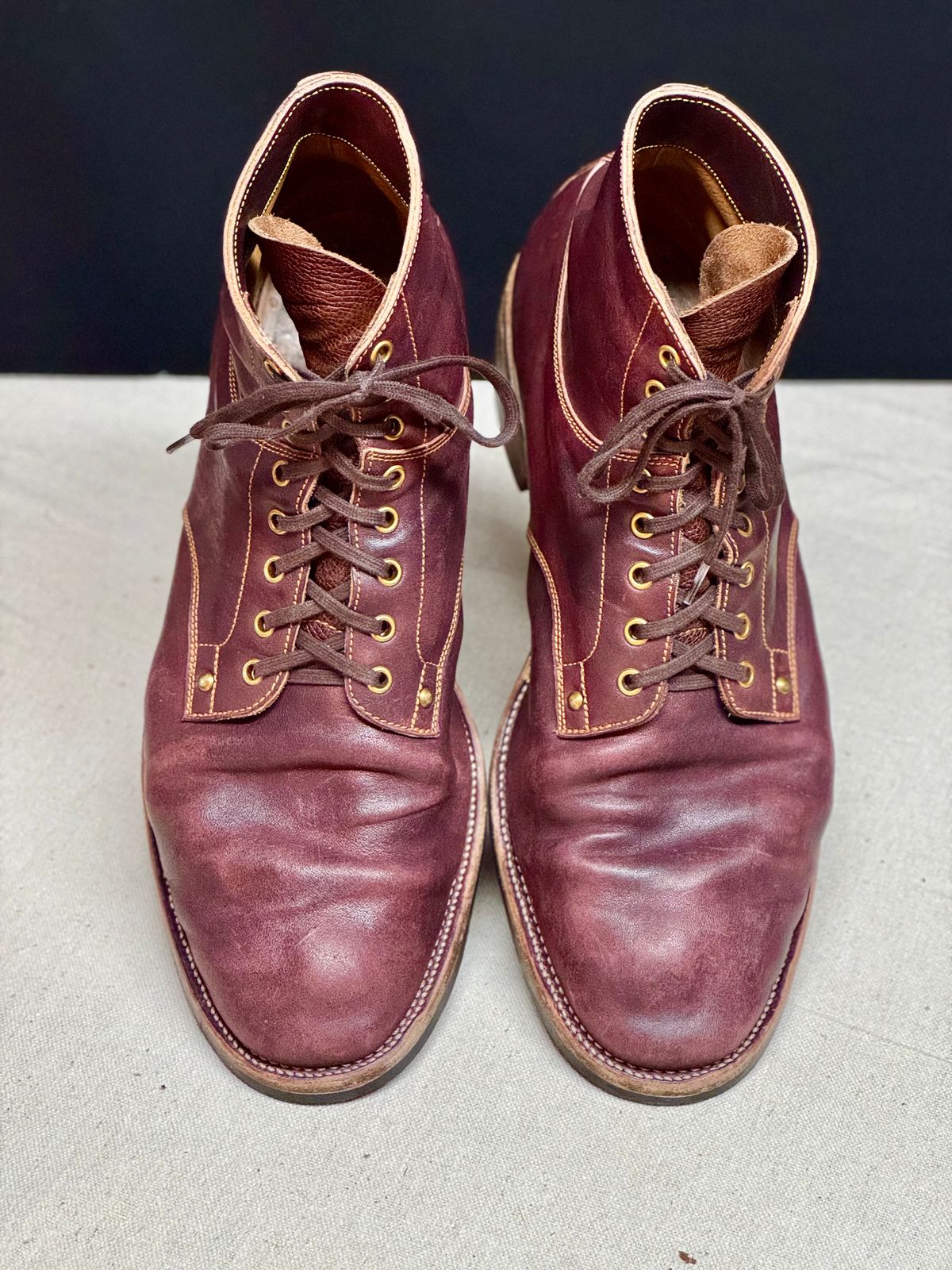 Photo by archwild on January 4, 2026 of the Østmo X Iron Boots Type 1 in Hand-Dyed Burgundy Maryam Washed Horsehide.