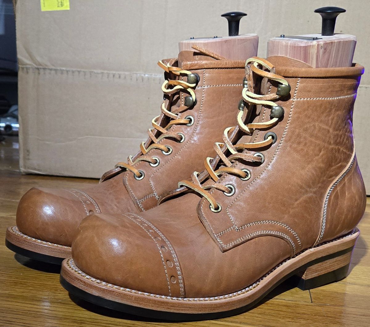 Photo by chuligani on September 4, 2025 of the Prof Barnets Bulky Cap Toe Boots in Maryam Shrunken Horse Culatta Honey.