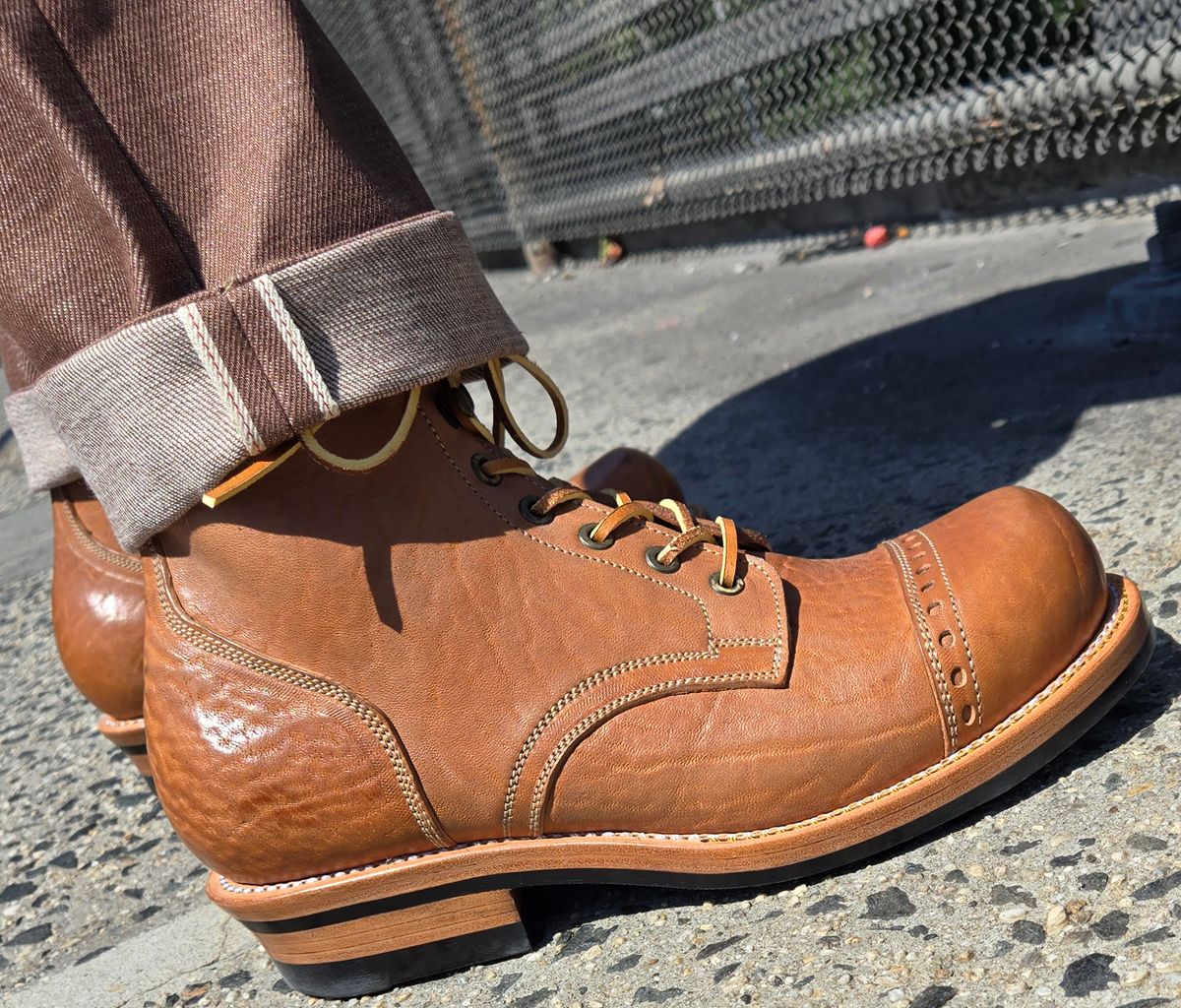 Photo by chuligani on September 4, 2025 of the Prof Barnets Bulky Cap Toe Boots in Maryam Shrunken Horse Culatta Honey.