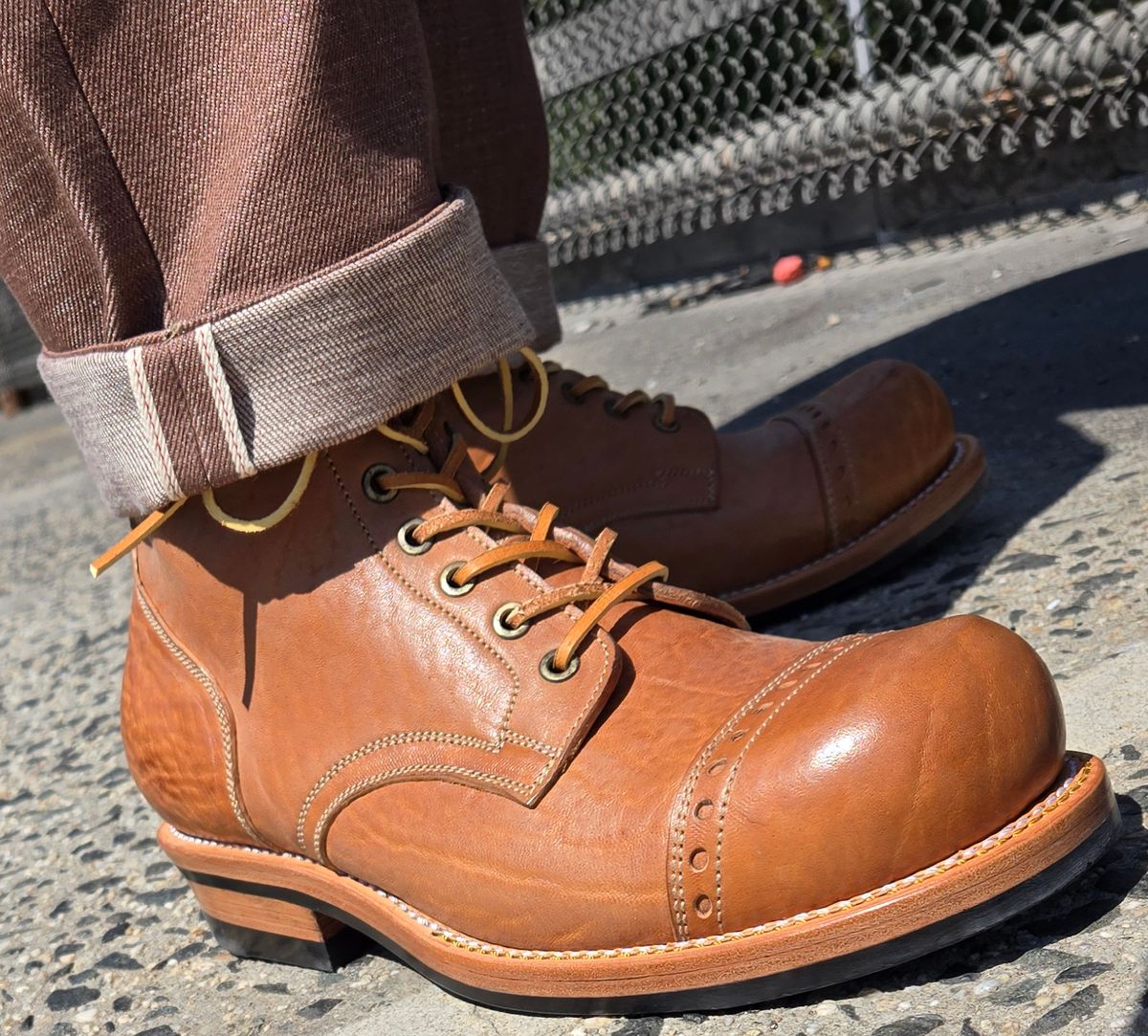 Photo by chuligani on September 4, 2025 of the Prof Barnets Bulky Cap Toe Boots in Maryam Shrunken Horse Culatta Honey.