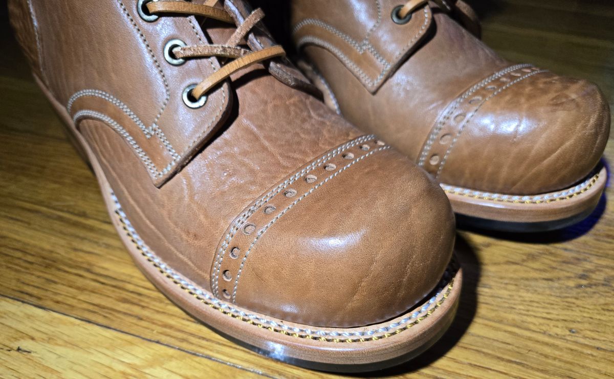 Photo by chuligani on September 4, 2025 of the Prof Barnets Bulky Cap Toe Boots in Maryam Shrunken Horse Culatta Honey.