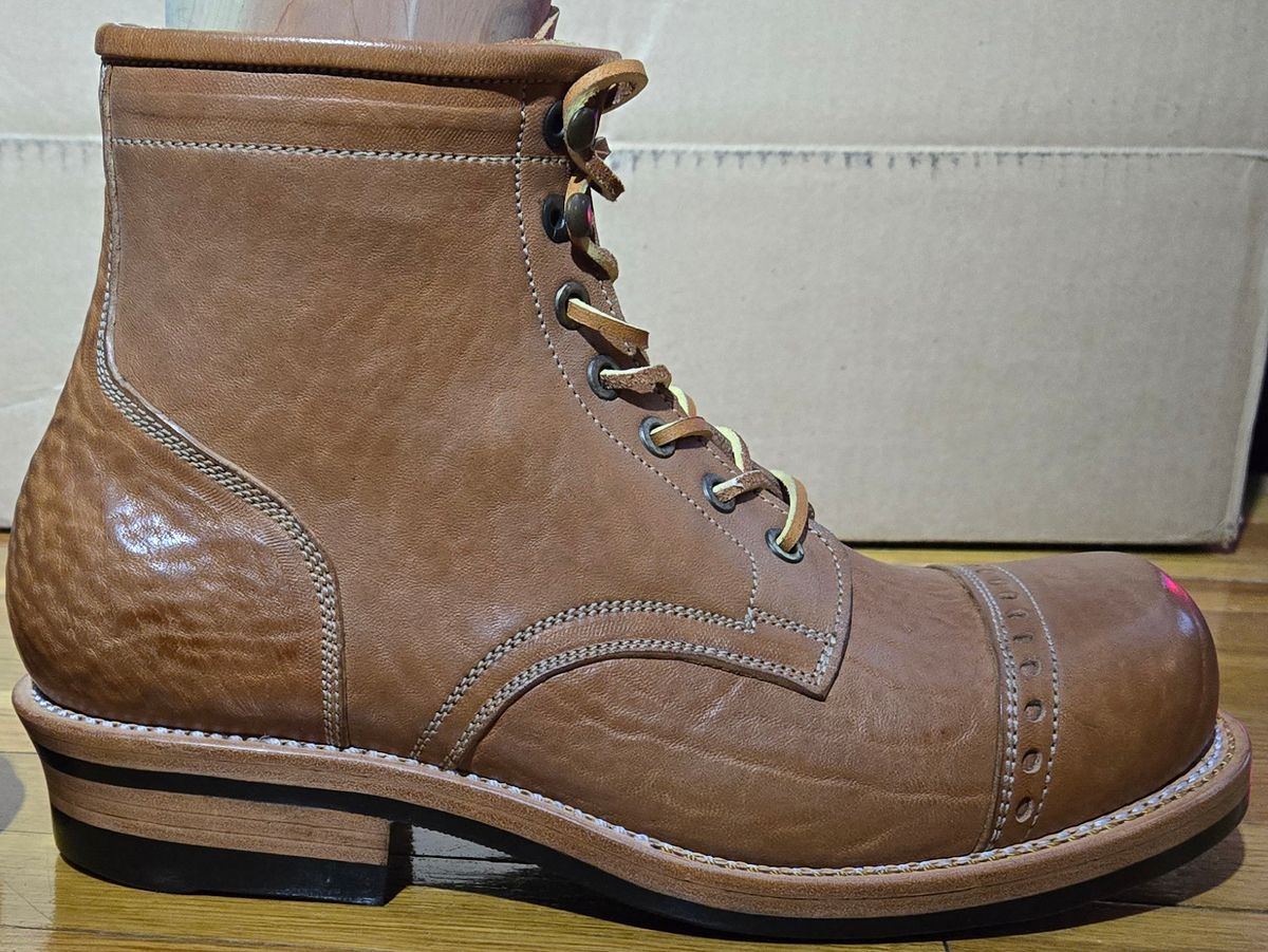 Photo by chuligani on September 4, 2025 of the Prof Barnets Bulky Cap Toe Boots in Maryam Shrunken Horse Culatta Honey.