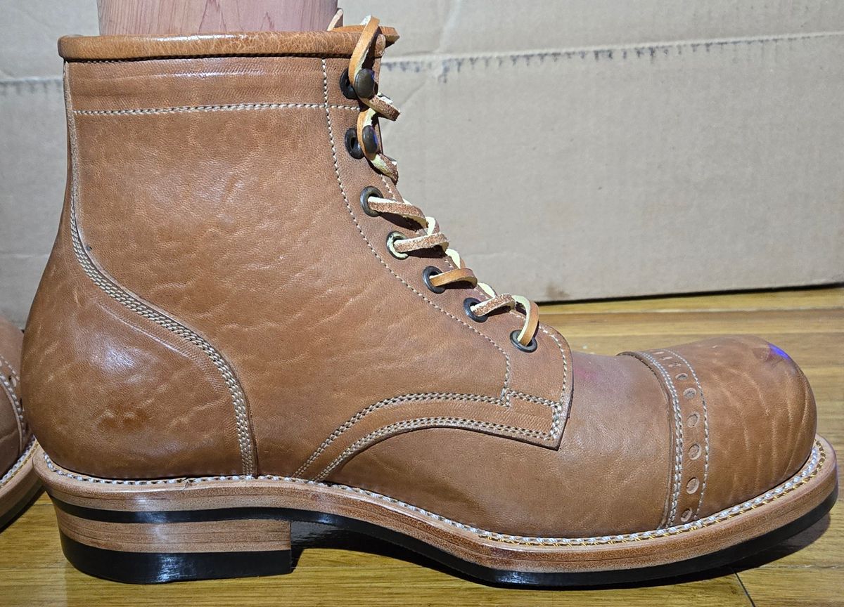 Photo by chuligani on September 4, 2025 of the Prof Barnets Bulky Cap Toe Boots in Maryam Shrunken Horse Culatta Honey.