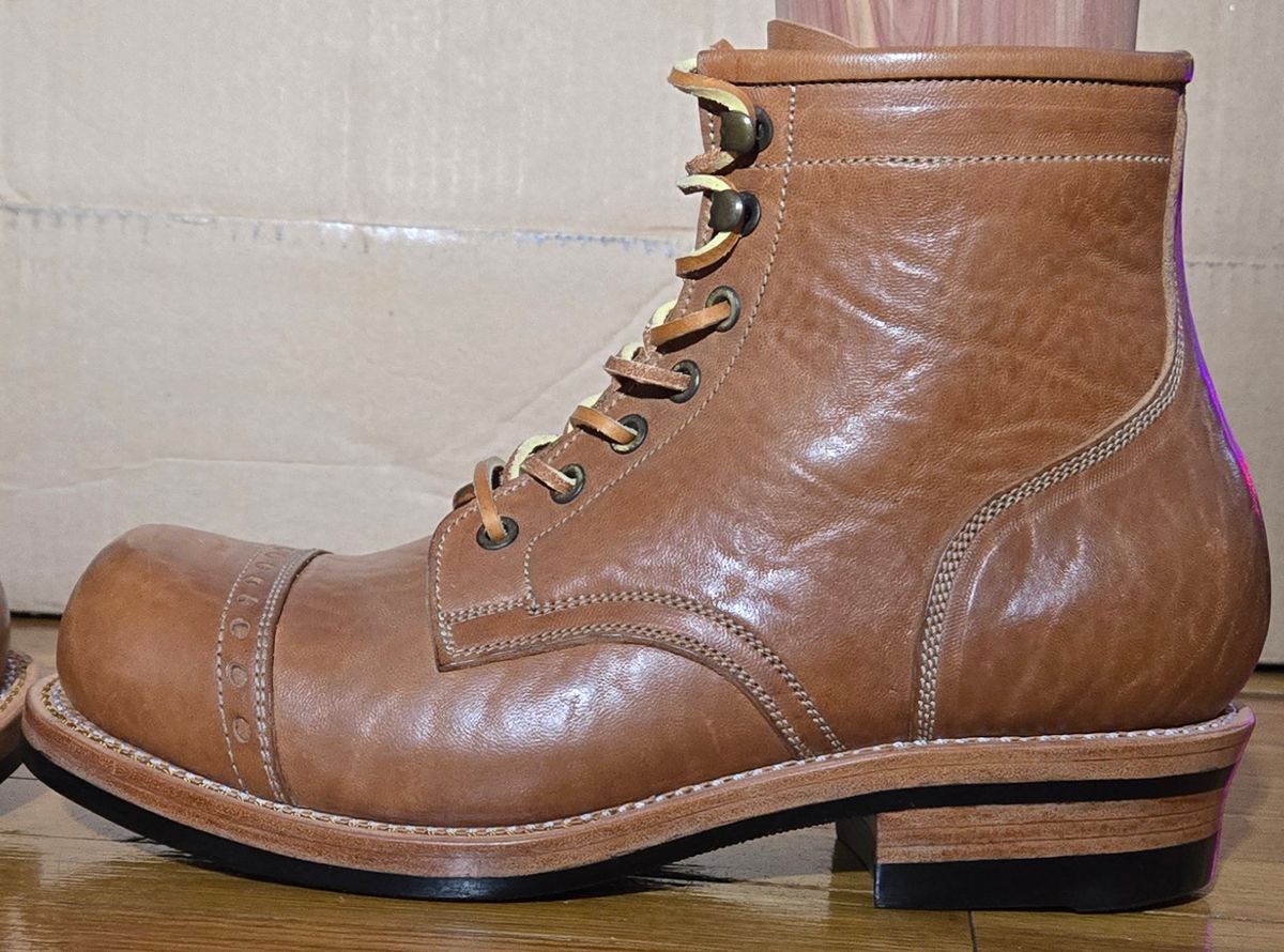 Photo by chuligani on September 4, 2025 of the Prof Barnets Bulky Cap Toe Boots in Maryam Shrunken Horse Culatta Honey.