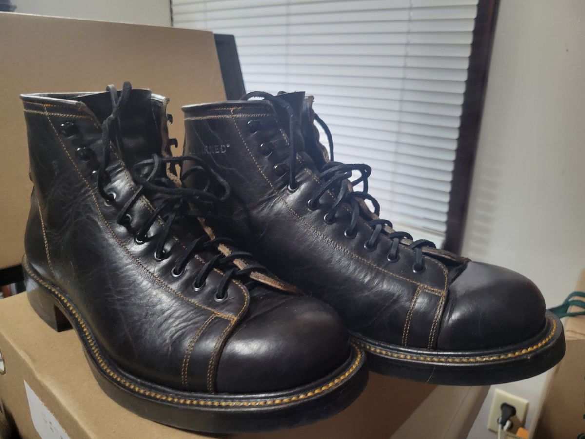 Photo by GrantR on January 2, 2026 of the Unmarked Archie Boots in Cisne Black Vegetable-Tanned Bison.