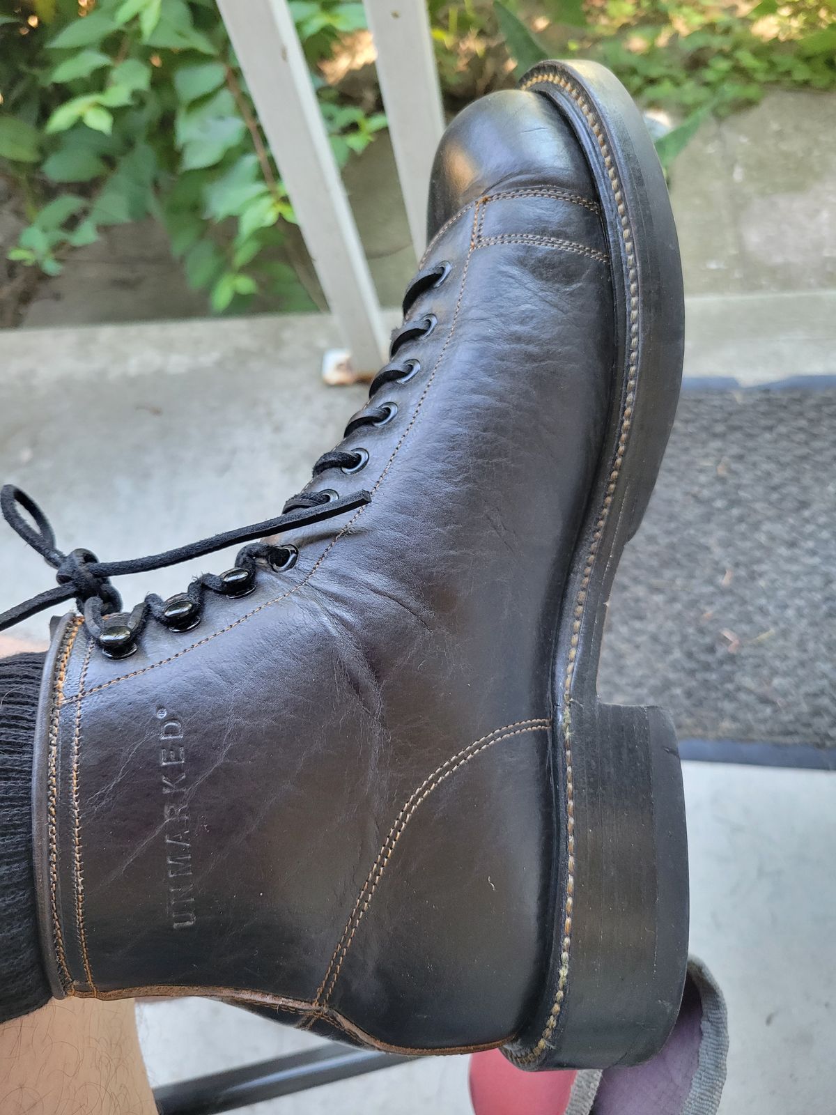 Photo by GrantR on June 19, 2026 of the Unmarked Archie Boots in Cisne Black Vegetable-Tanned Bison.