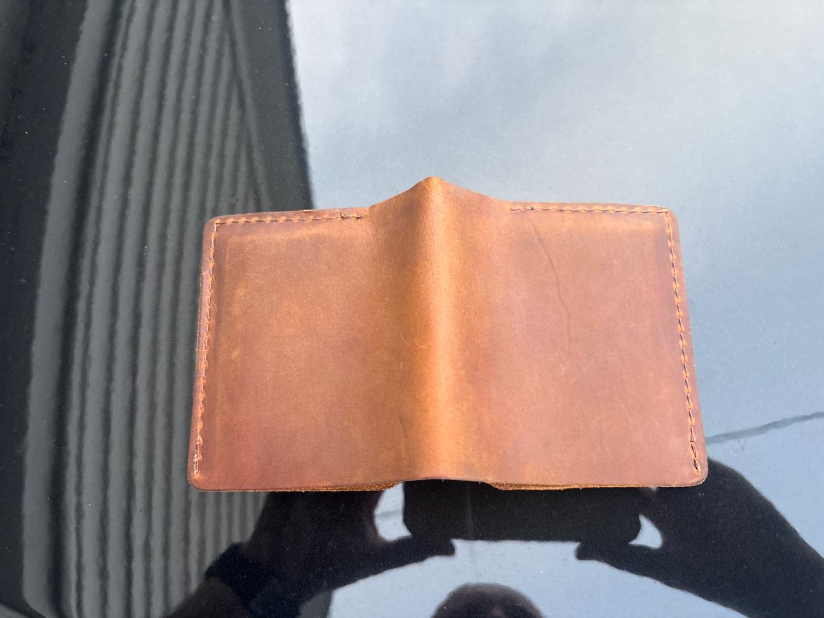 Photo by ZFitzGolf on June 24, 2025 of the Nicks Billfold in Horween Orange Predator.