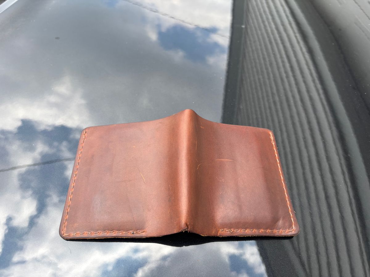 Photo by ZFitzGolf on July 8, 2025 of the Nicks Billfold in Horween Orange Predator.