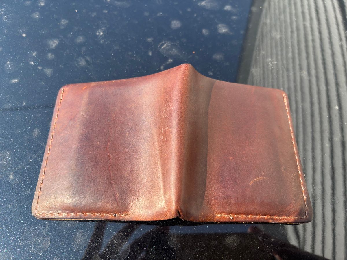 Photo by ZFitzGolf on August 11, 2025 of the Nicks Billfold in Horween Orange Predator.