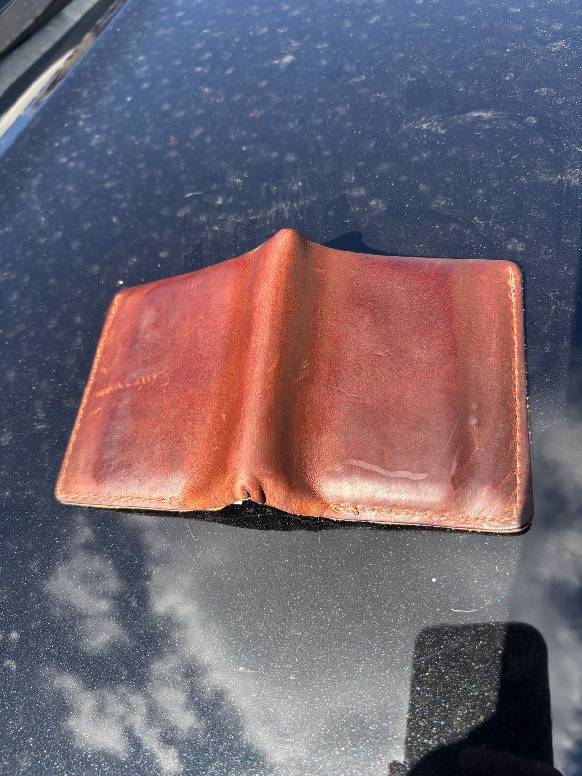 Photo by ZFitzGolf on September 26, 2025 of the Nicks Billfold in Horween Orange Predator.