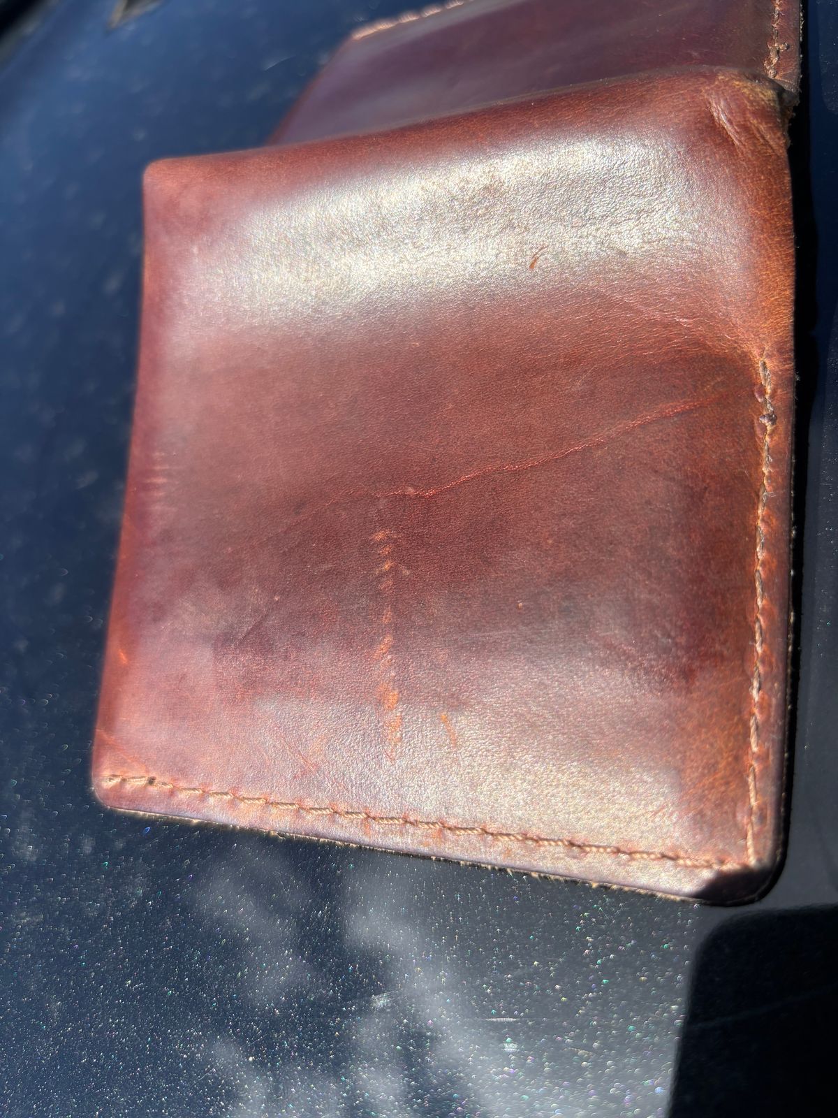 Photo by ZFitzGolf on September 26, 2025 of the Nicks Billfold in Horween Orange Predator.