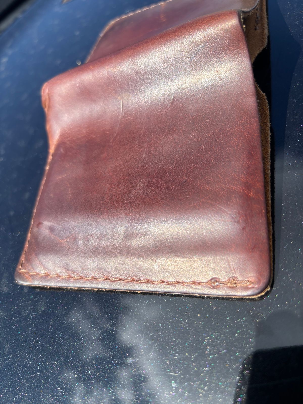 Photo by ZFitzGolf on September 26, 2025 of the Nicks Billfold in Horween Orange Predator.