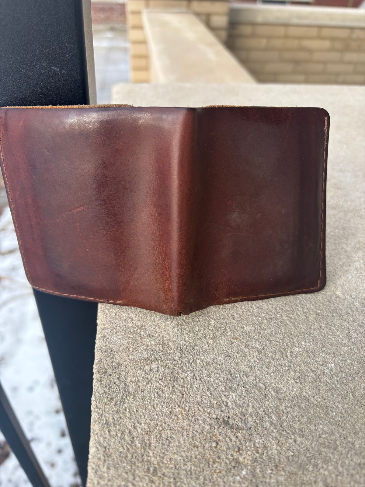 Photo by ZFitzGolf on January 4, 2026 of the Nicks Billfold in Horween Orange Predator.