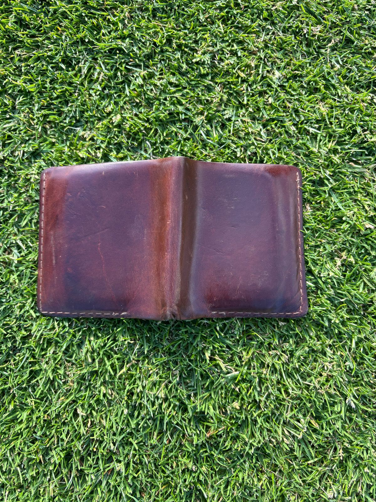 Photo by ZFitzGolf on May 21, 2026 of the Nicks Billfold in Horween Orange Predator.