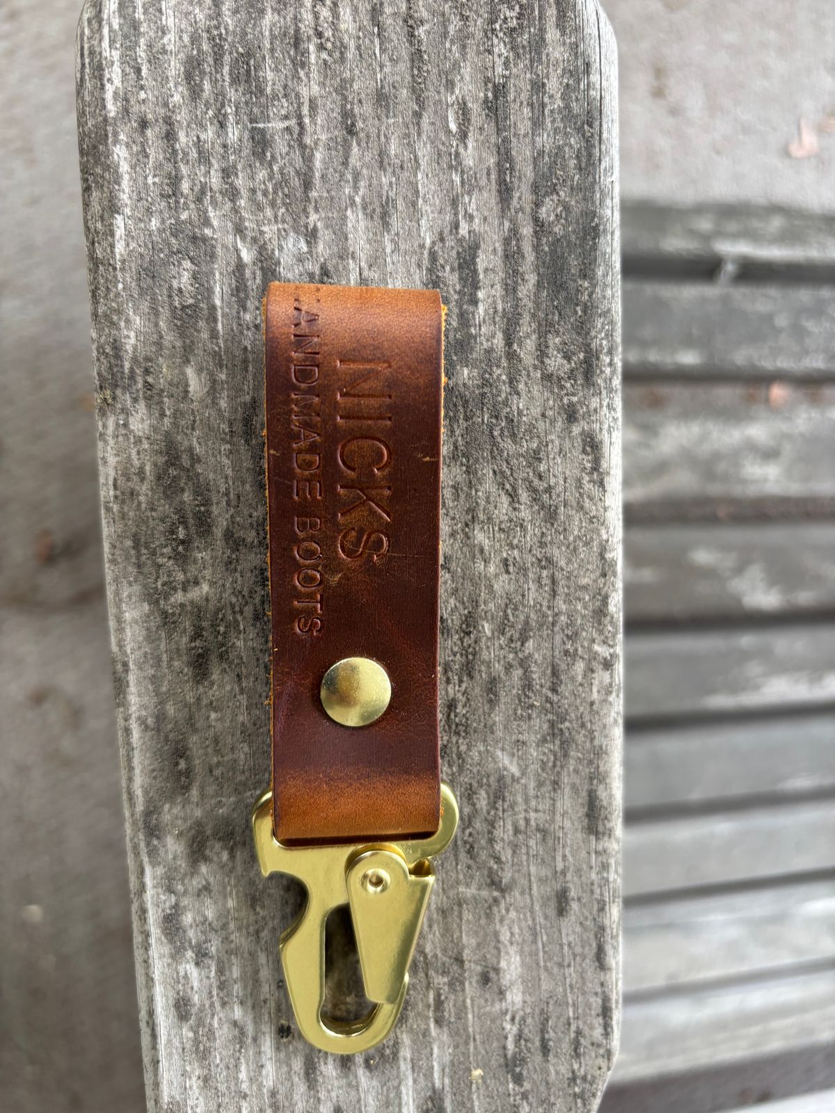 Photo by ZFitzGolf on August 5, 2025 of the Nicks Key Clip in Horween Orange Predator.