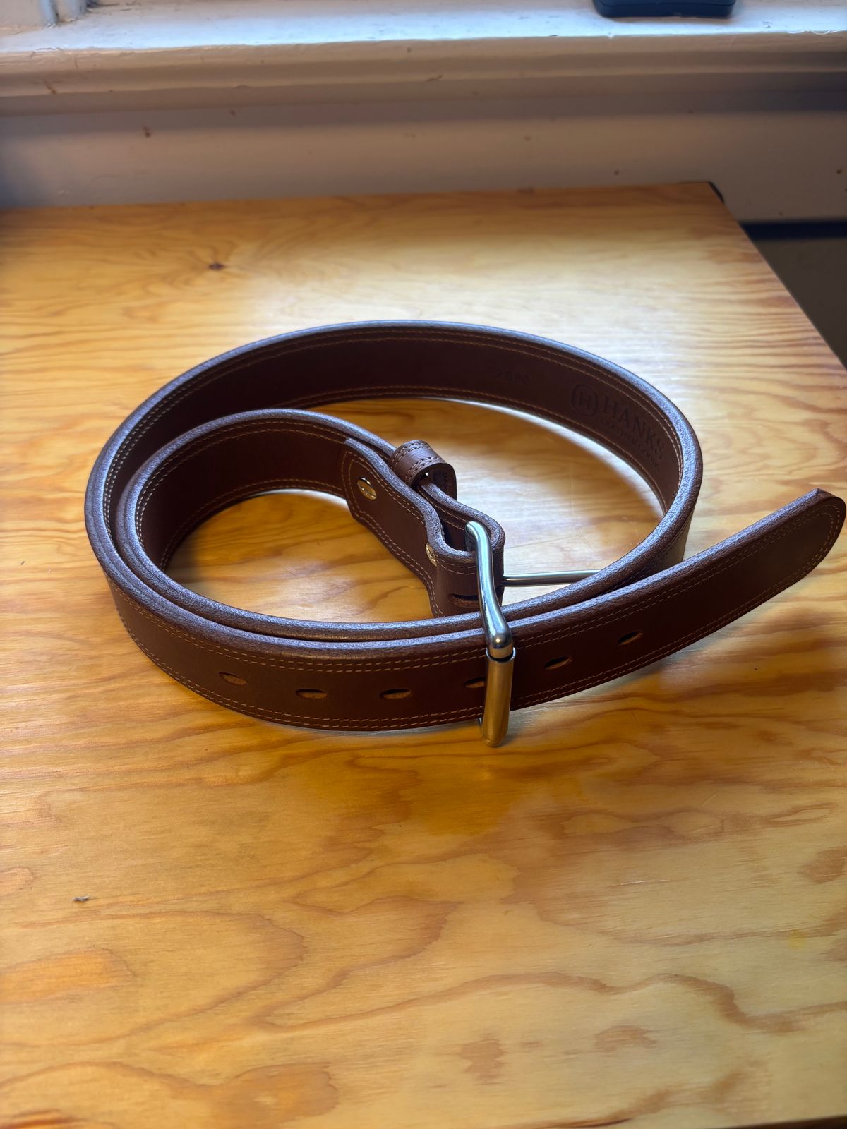 Photo by ZFitzGolf on November 28, 2025 of the Hanks Leather Goods Montana Bison Double Layer in Law Tanning Peanut Big Horn Shrunken Bison.