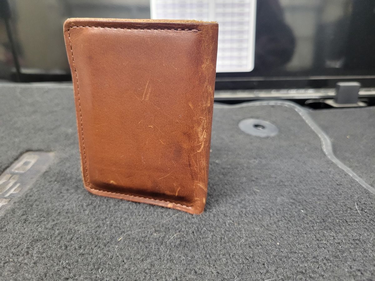Photo by Cecilk on December 2, 2025 of the Ashland Leather Vertical Bugs Moran Wallet in Horween Brown Veg Tanned.