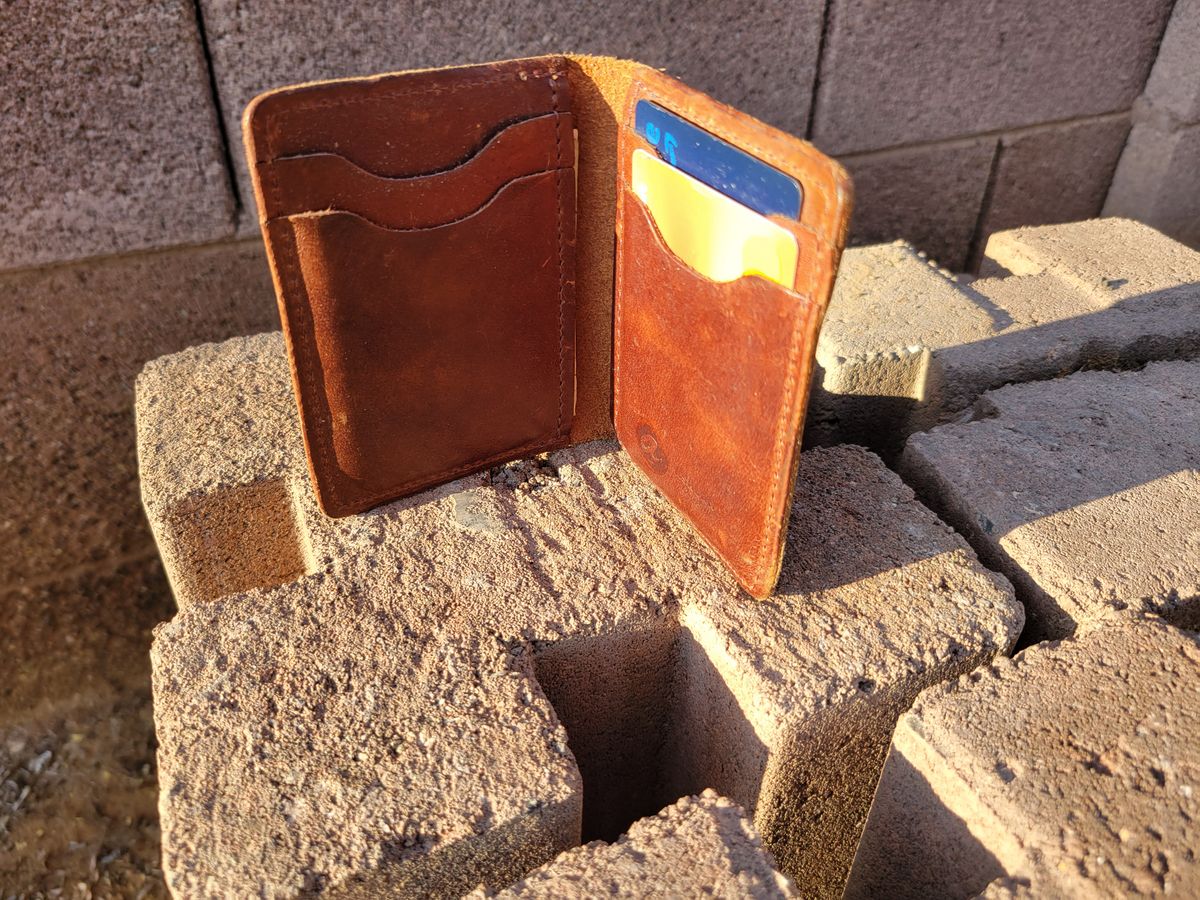 Photo by Cecilk on January 2, 2026 of the Ashland Leather Vertical Bugs Moran Wallet in Horween Brown Veg Tanned.