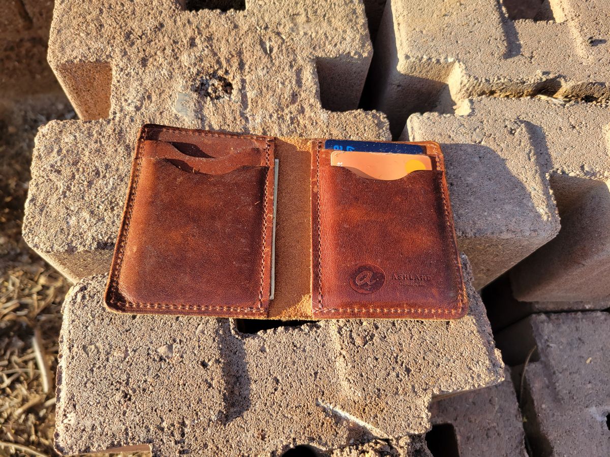Photo by Cecilk on January 2, 2026 of the Ashland Leather Vertical Bugs Moran Wallet in Horween Brown Veg Tanned.
