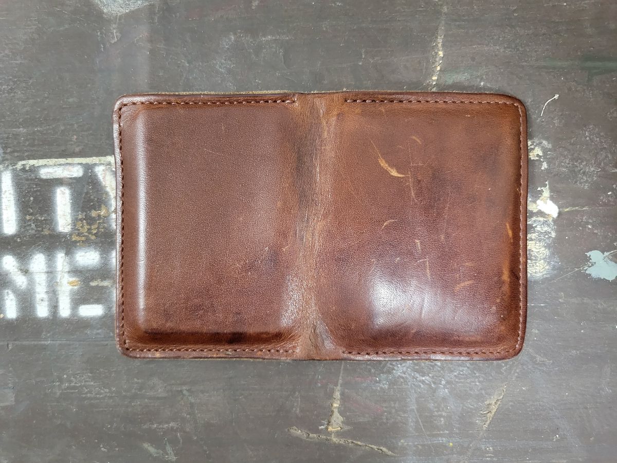 Photo by Cecilk on April 2, 2026 of the Ashland Leather Vertical Bugs Moran Wallet in Horween Brown Veg Tanned.