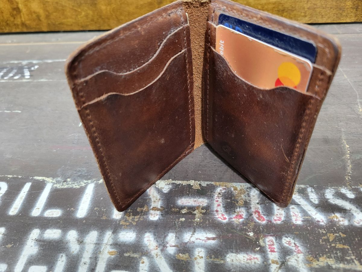 Photo by Cecilk on April 2, 2026 of the Ashland Leather Vertical Bugs Moran Wallet in Horween Brown Veg Tanned.