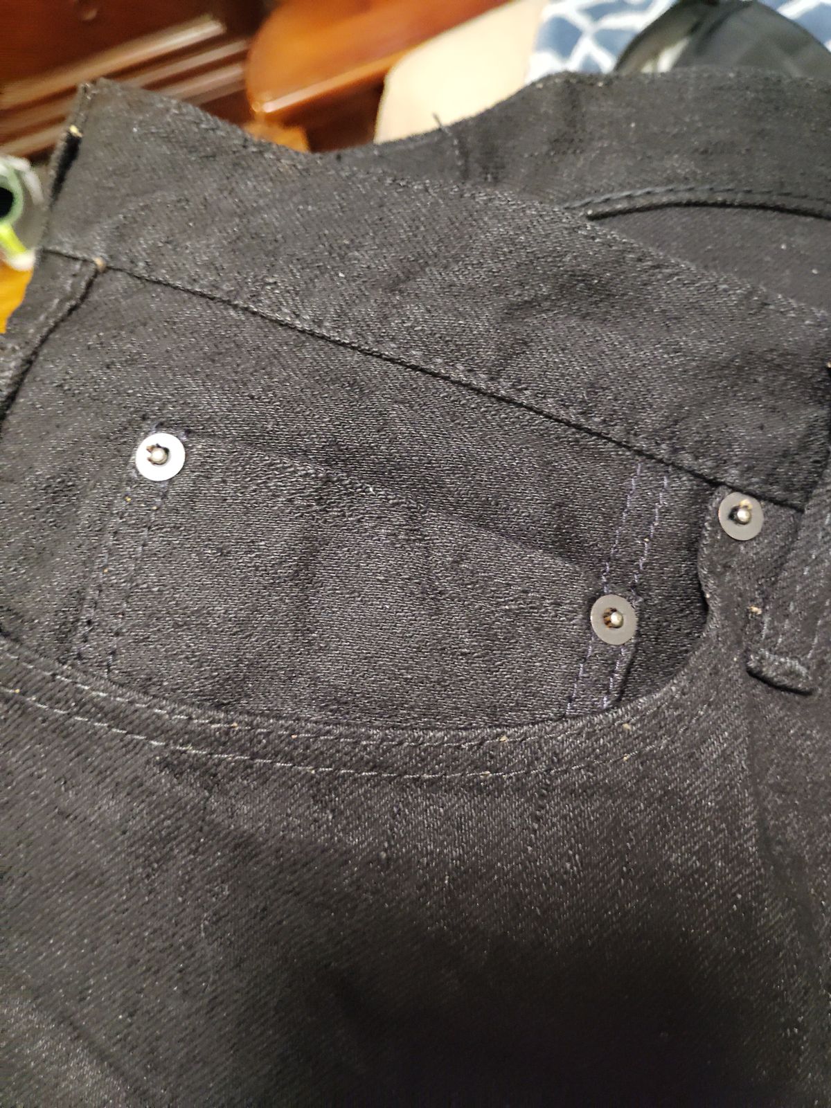 Photo by SwankeLorde on September 1, 2024 of the Pure Blue Japan TCD-003-BK in 14oz. Slub Teacore Denim - Double Black X Brown Core.