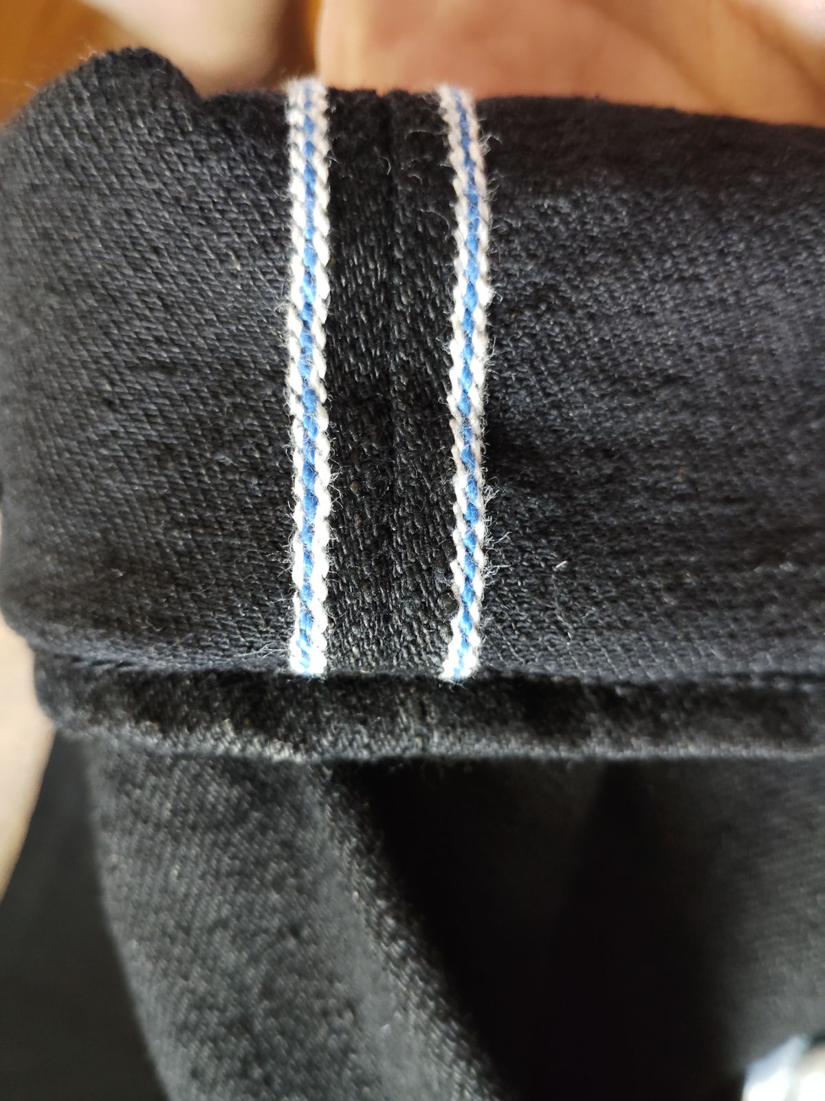Photo by SwankeLorde on September 1, 2024 of the Pure Blue Japan TCD-003-BK in 14oz. Slub Teacore Denim - Double Black X Brown Core.