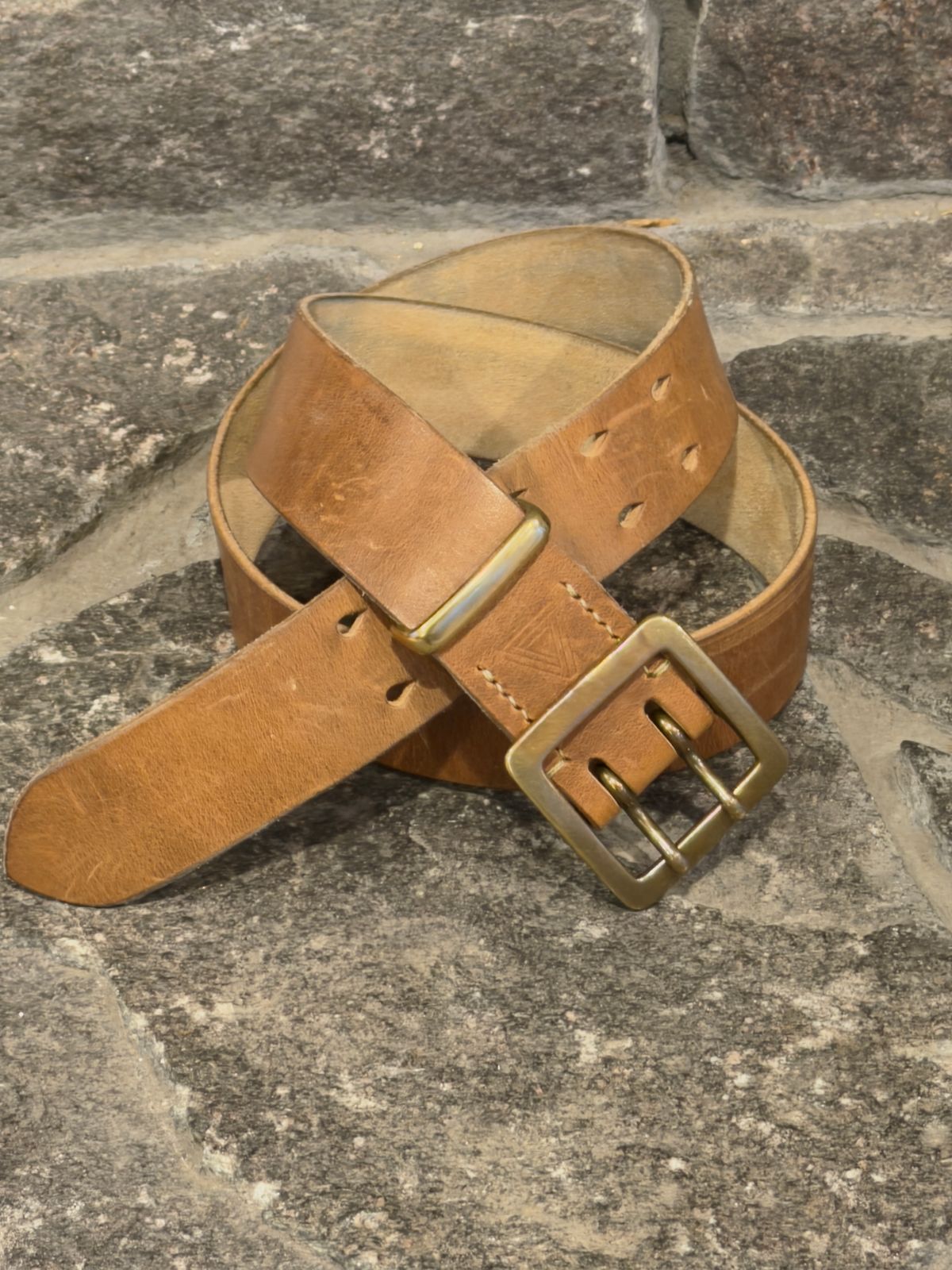 Photo by Aberhood on December 2, 2025 of the Hollows Leather Rail Belt in Dark Sand Cypress.