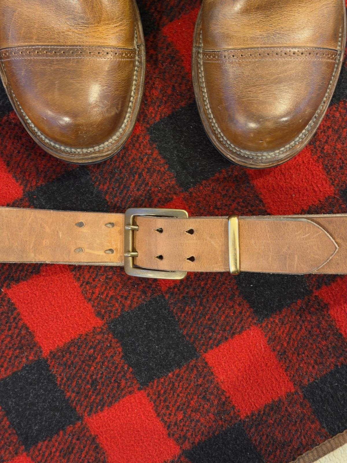 Photo by Aberhood on December 2, 2025 of the Hollows Leather Rail Belt in Dark Sand Cypress.