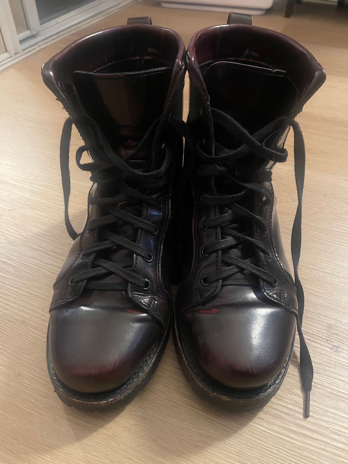 Photo by Tina_Sparkle on December 6, 2024 of the Panther Power Boots Malcolm X Brochole Wine in Cherry Black Chameleon Mexican Tannage.