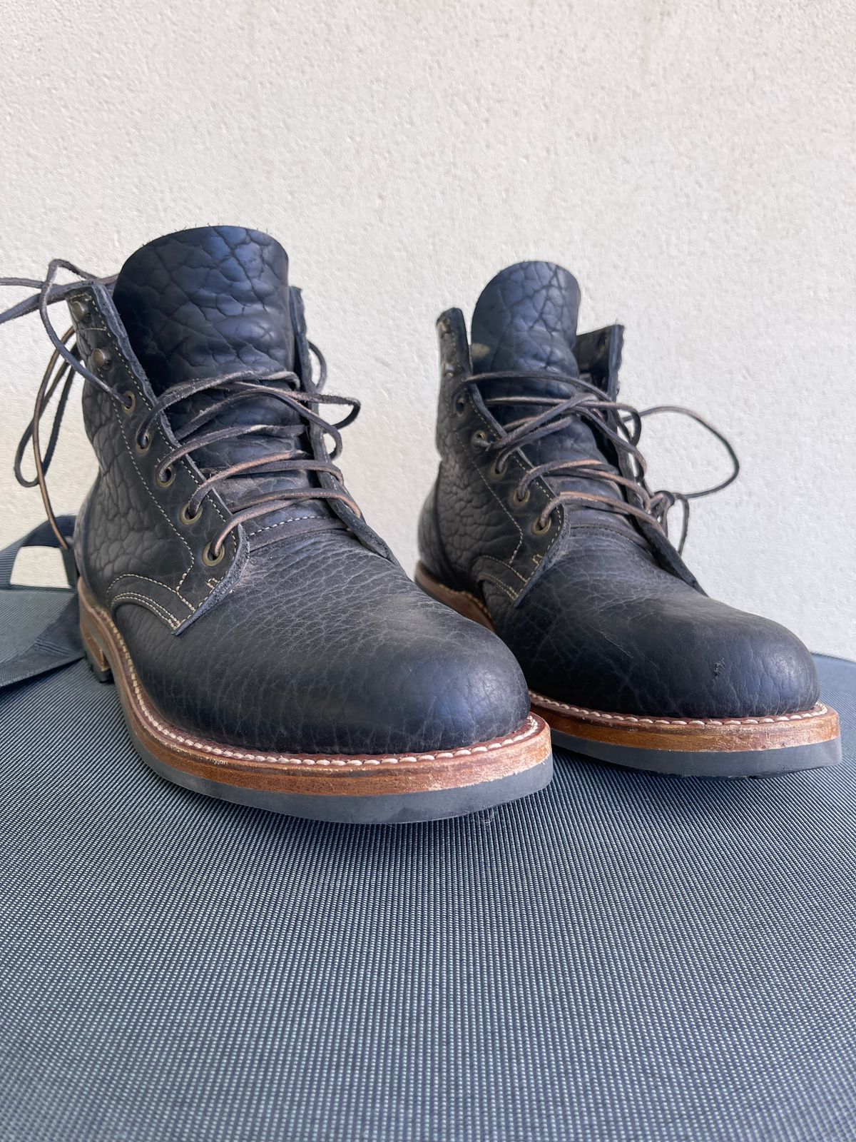 Photo by aussiebootboy on January 17, 2025 of the Truman Plain Toe Boot in Law Tanning Black Big Horn Shrunken Bison.