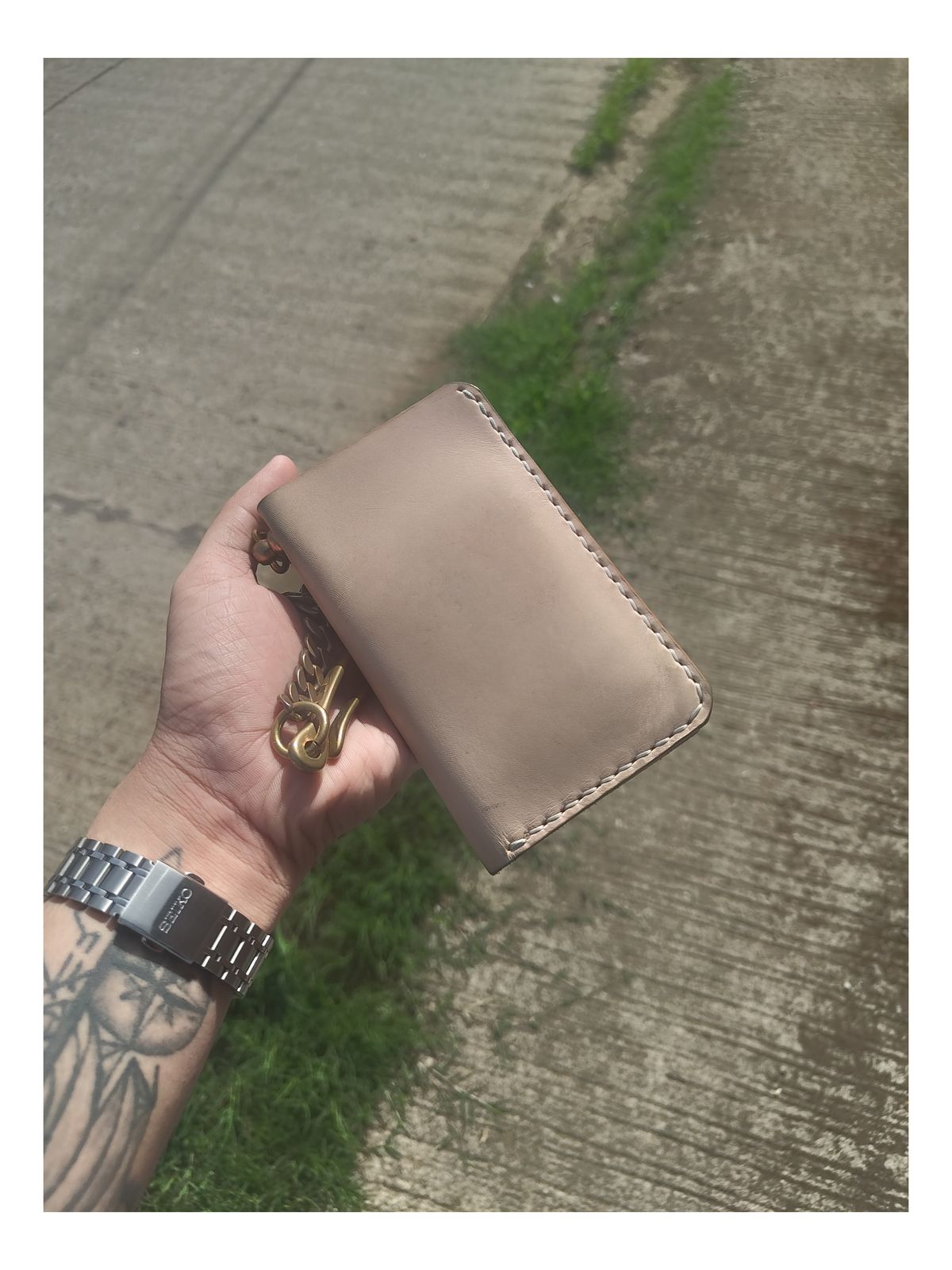 Photo by well.dan on June 20, 2026 of the Pabloshandcraftedgoods Hand-stitched Mid Wallet in Natural Vegetable Tan Leather.