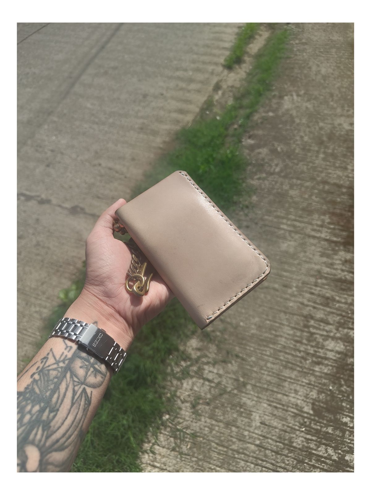 Photo by well.dan on June 20, 2026 of the Pabloshandcraftedgoods Hand-stitched Mid Wallet in Natural Vegetable Tan Leather.