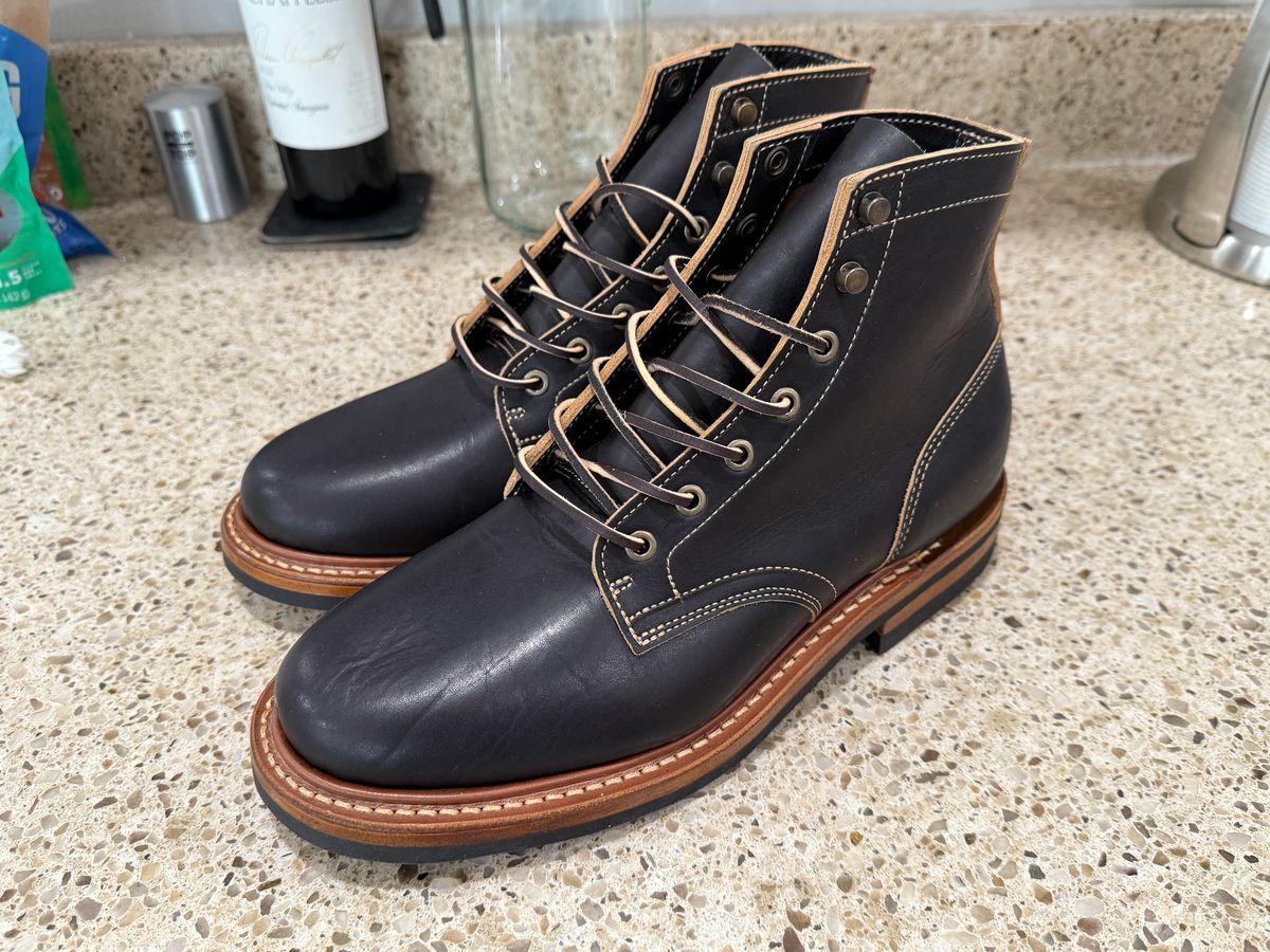 Photo by sweatpantszach on June 23, 2025 of the Truman Plain Toe Boot in Black Teacore.