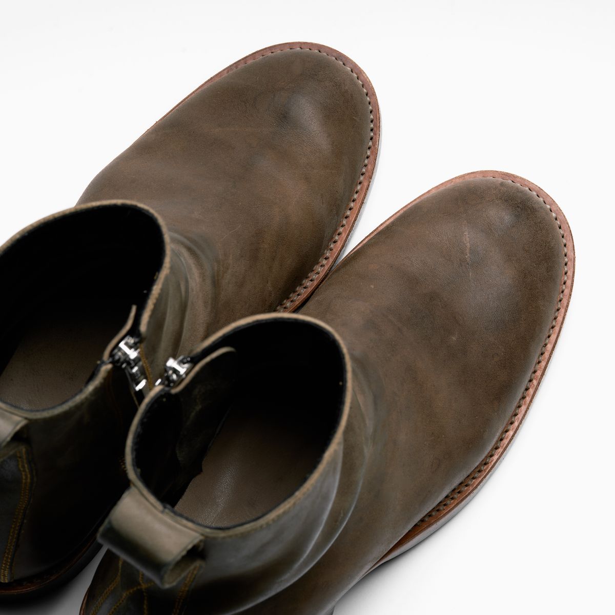 Photo by SighUnzips on November 12, 2024 of the Fortis Boots Antasena in Maryam Salvia Horsebutt.