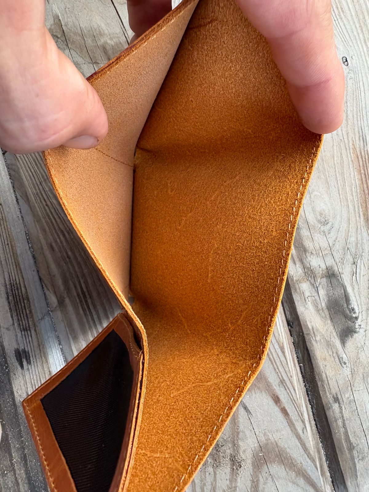 Photo by MuttBarker on October 4, 2025 of the Rodos Leather Crafts Camel Full Grain Leather Trifold Wallet in Tochigi Oil Vachetta #1 Light Brown.