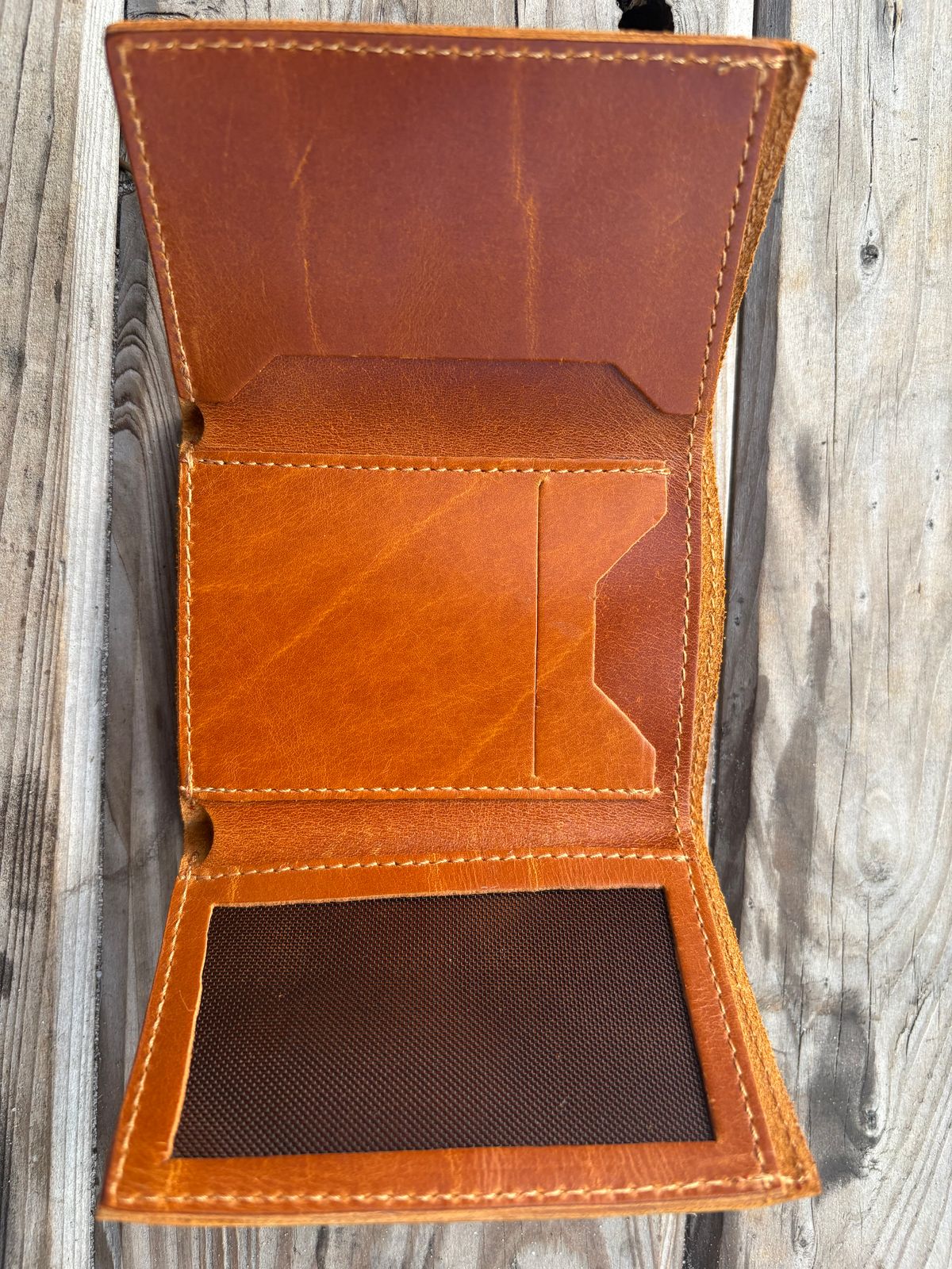 Photo by MuttBarker on October 4, 2025 of the Rodos Leather Crafts Camel Full Grain Leather Trifold Wallet in Tochigi Oil Vachetta #1 Light Brown.