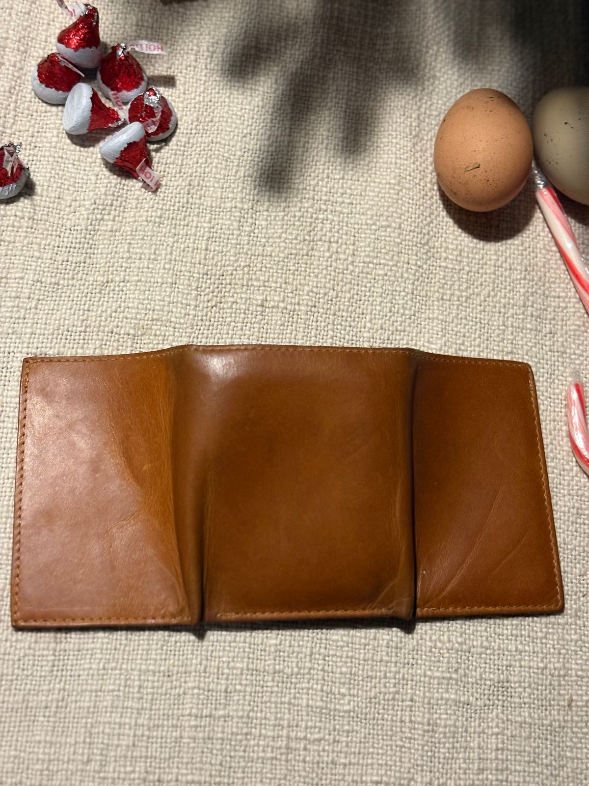 Photo by MuttBarker on January 6, 2026 of the Rodos Leather Crafts Camel Full Grain Leather Trifold Wallet in Tochigi Oil Vachetta #1 Light Brown.