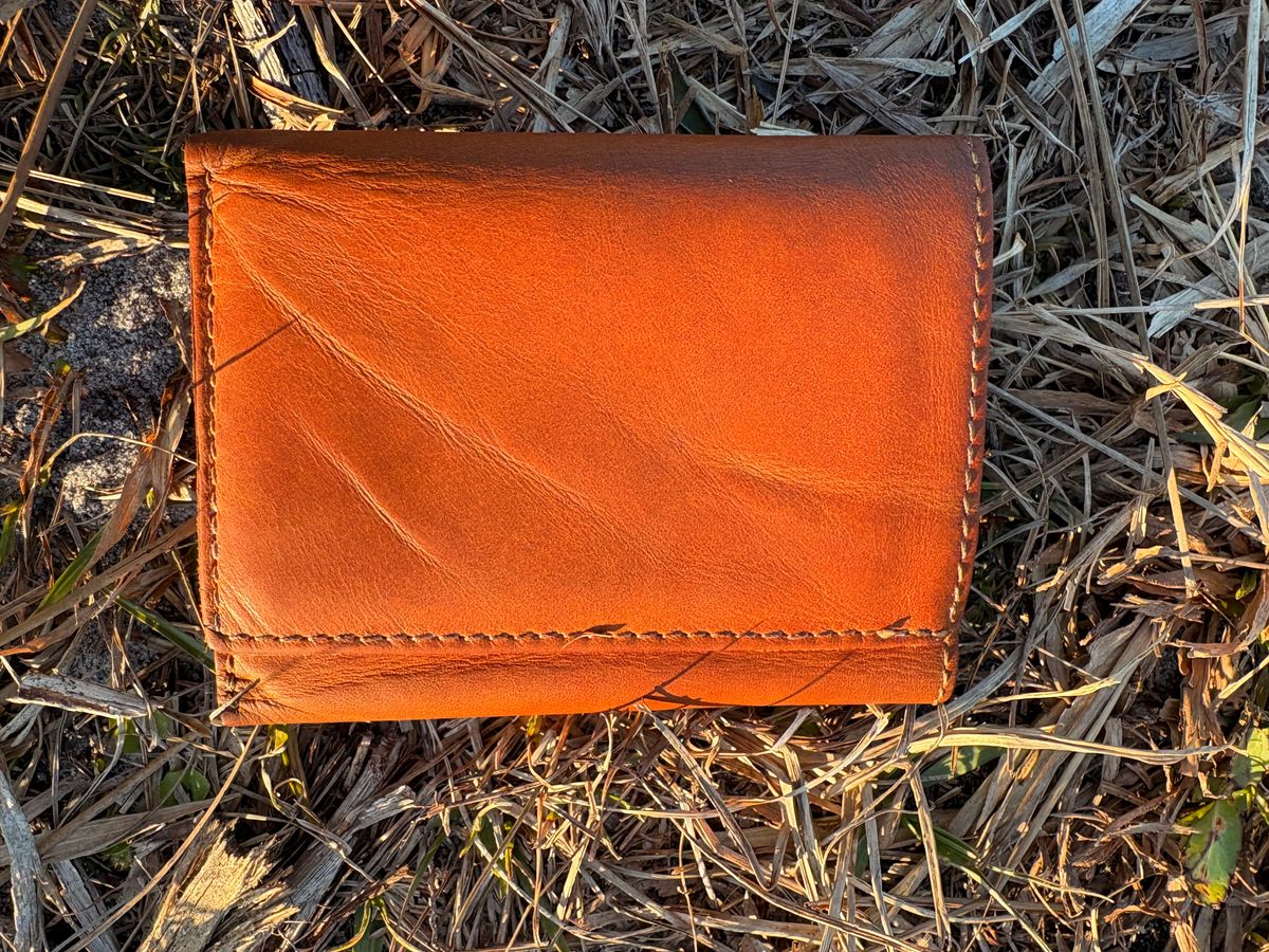 Photo by MuttBarker on February 5, 2026 of the Rodos Leather Crafts Camel Full Grain Leather Trifold Wallet in Tochigi Oil Vachetta #1 Light Brown.